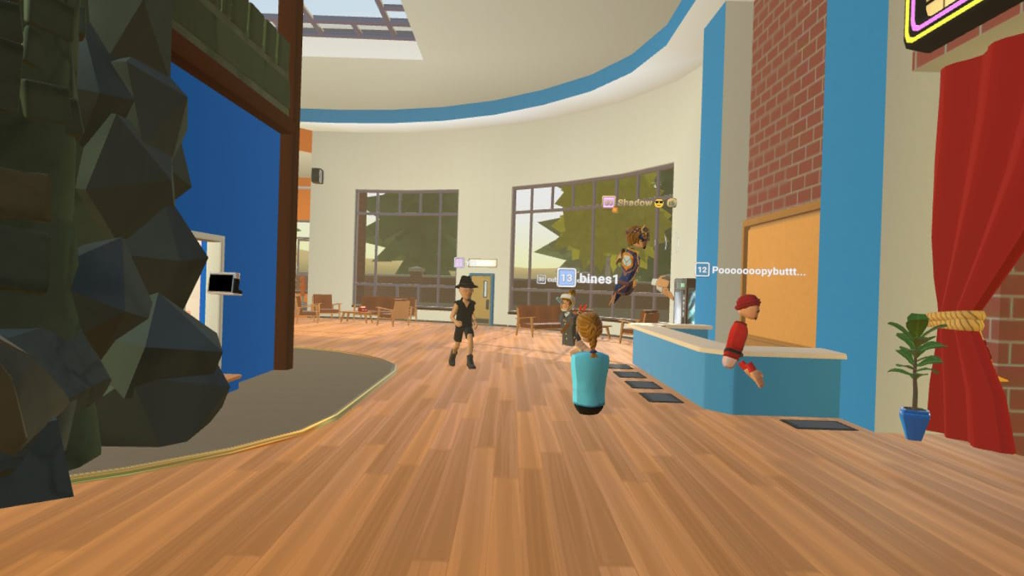 VR avatars walking around in a gym area.